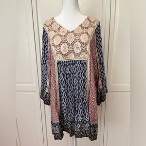 XL John Mark tunic, hand embroidered, lays beautifully.  Beige, blue, maroon
